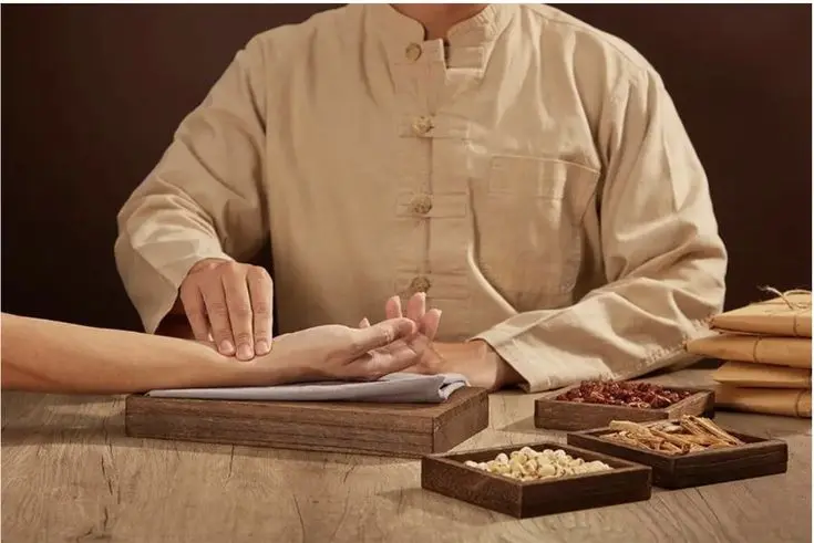 Traditional consultation with pulse assessment and herbs